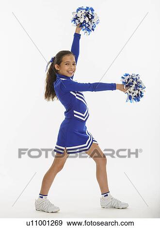 Portrait of cheerleader ( 10-11 years) holding pom-pom View Large Photo Image Stock Photo - Portrait of cheerleader ( 10-11 years) holding pom-pom. Fotosearch