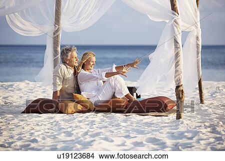 Portrait of couple on beach View Large Photo Image Picture - Portrait of couple on beach. Fotosearch