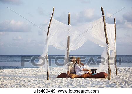 Portrait of couple on beach View Large Photo Image Stock Photo - Portrait of couple on beach. Fotosearch