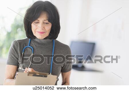 Stock Image - Portrait of doctor. Fotosearch