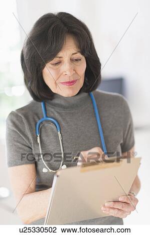 Stock Image - Portrait of doctor. Fotosearch