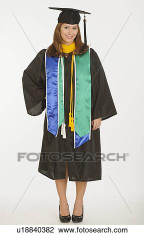 Portrait of graduate student holding diploma View Large Photo Image Stock Image - Portrait of graduate student holding diploma. Fotosearch