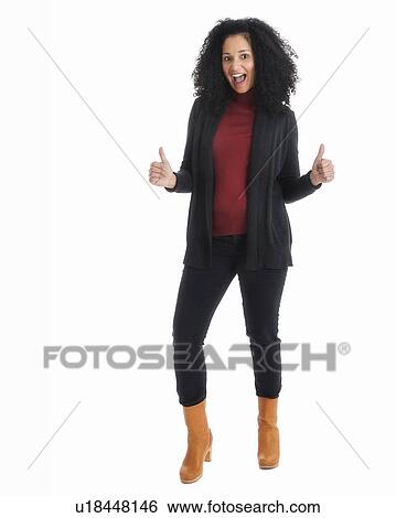 Portrait of mid adult woman gesturing, studio shot View Large Photo Image Stock Photograph - Portrait of mid adult woman gesturing, studio shot. Fotosearch
