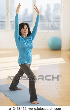 Portrait of senior woman exercising View Large Photo Image Stock Image - Portrait of senior woman exercising. Fotosearch