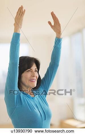 Portrait of senior woman exercising View Large Photo Image Stock Image - Portrait of senior woman exercising. Fotosearch