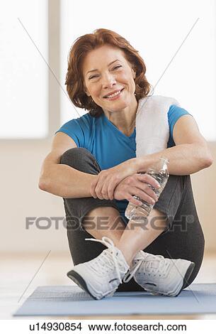 Portrait of senior woman in gym View Large Photo Image Picture - Portrait of senior woman in gym. Fotosearch