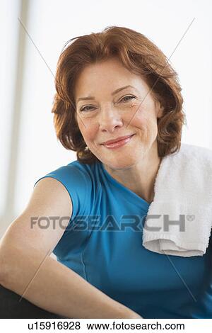 Stock Photo - Portrait of senior woman in gym. Fotosearch