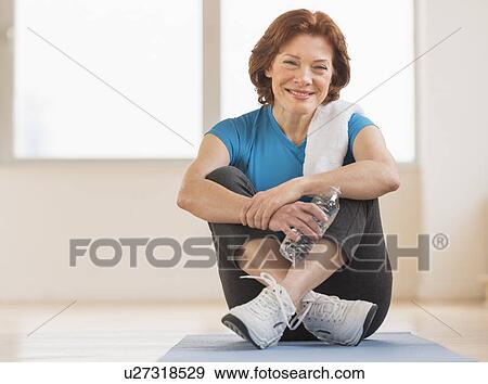 Portrait of senior woman in gym View Large Photo Image Stock Photo - Portrait of senior woman in gym. Fotosearch