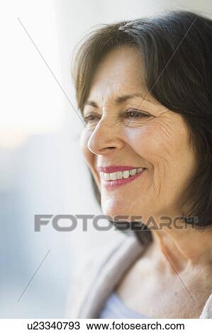 Stock Image - Portrait of senior woman. Fotosearch