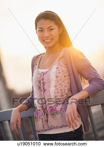 Portrait of smiling teenage girl ( 16-17 years) View Large Photo Image Stock Image - Portrait of smiling teenage girl ( 16-17 years). Fotosearch