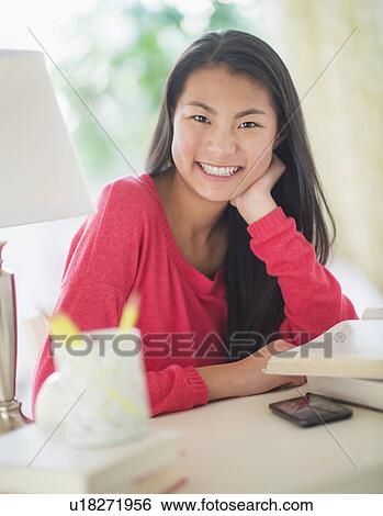 Portrait of teenage girl ( 16-17 years) smiling View Large Photo Image Stock Photograph - Portrait of teenage girl ( 16-17 years) smiling. Fotosearch