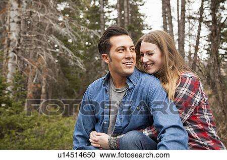 Portrait of young couple in non-urban scene View Large Photo Image Stock Image - Portrait of young couple in non-urban scene. Fotosearch