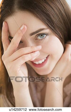 Portrait of young woman View Large Photo Image Stock Image - Portrait of young woman. Fotosearch
