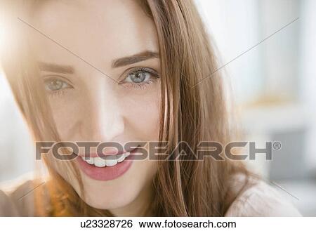 Stock Photograph - Portrait of young woman. Fotosearch