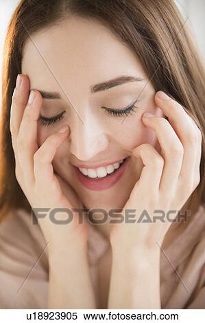 Stock Photography - Portrait of young woman. Fotosearch