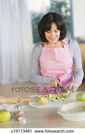 Senior woman baking View Large Photo Image Stock Image - Senior woman baking. Fotosearch