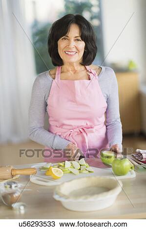 Senior woman baking View Large Photo Image Stock Image - Senior woman baking. Fotosearch