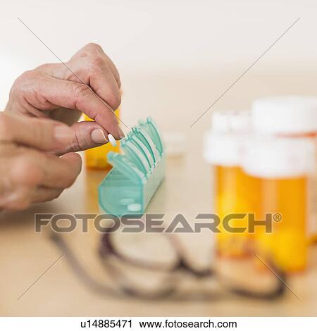 Senior woman dozing pills View Large Photo Image Stock Image - Senior woman dozing pills. Fotosearch