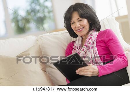 Senior woman with digital tablet View Large Photo Image Stock Photo - Senior woman with digital tablet. Fotosearch