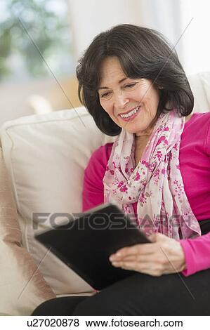 Senior woman with digital tablet View Large Photo Image Stock Photo - Senior woman with digital tablet. Fotosearch