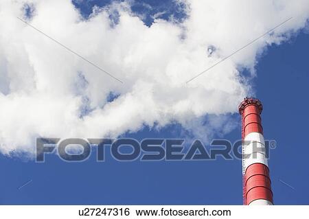 Smoke emitting from smoke stack View Large Photo Image Stock Photograph - Smoke emitting from smoke stack. Fotosearch