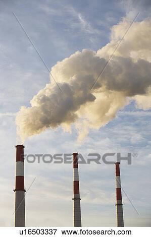 Stock Photo - Smoke emitting from smoke stacks. Fotosearch