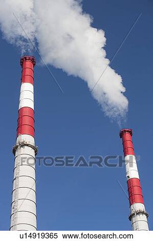 Smoke emitting from smoke stacks View Large Photo Image Stock Photography - Smoke emitting from smoke stacks. Fotosearch