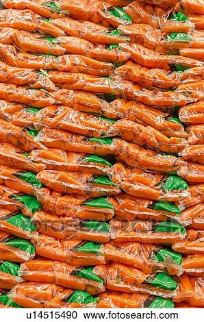 Stack of plastic bags packed with carrots View Large Photo Image Stock Image - Stack of plastic bags packed with carrots. Fotosearch