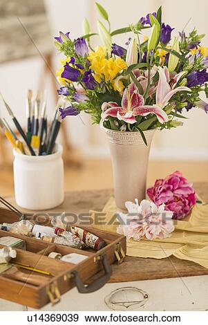 Still life with fresh bouquet and box of paints View Large Photo Image Stock Photo - Still life with fresh bouquet and box of paints. Fotosearch