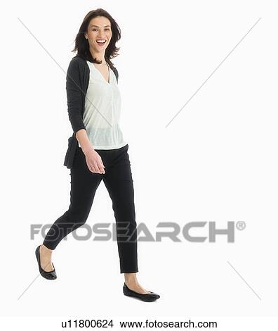 Studio portrait of mid adult woman View Large Photo Image Picture - Studio portrait of mid adult woman. Fotosearch