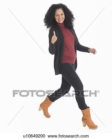 Studio portrait of mid adult woman View Large Photo Image Stock Image - Studio portrait of mid adult woman. Fotosearch