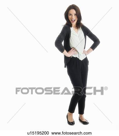 Stock Image - Studio portrait of mid adult woman. Fotosearch