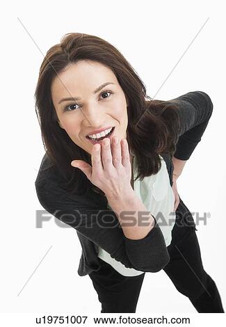 Stock Photo - Studio portrait of mid adult woman. Fotosearch