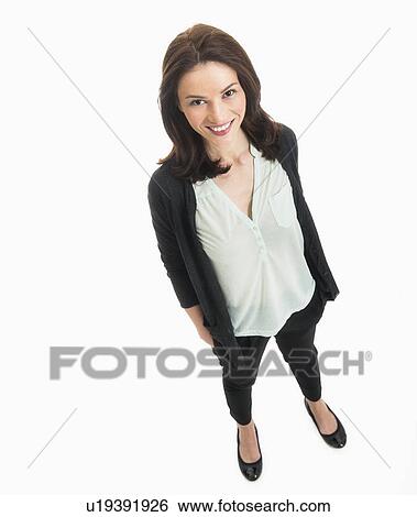 Stock Photograph - Studio portrait of mid adult woman. Fotosearch