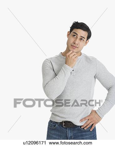 Studio portrait of young man View Large Photo Image Stock Image - Studio portrait of young man. Fotosearch