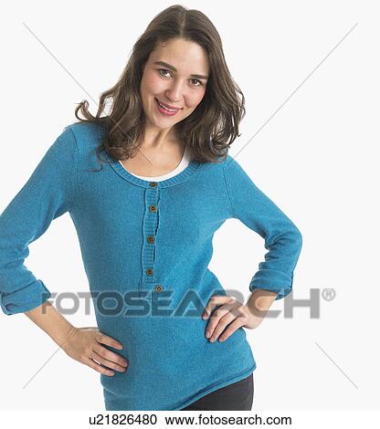Studio portrait of young woman smiling View Large Photo Image Stock Image - Studio portrait of young woman smiling. Fotosearch