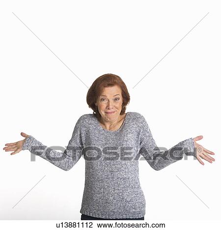 Studio shot of senior woman smiling View Large Photo Image Stock Image - Studio shot of senior woman smiling. Fotosearch