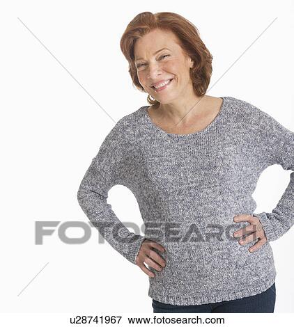 Studio shot of senior woman smiling View Large Photo Image Stock Photo - Studio shot of senior woman smiling. Fotosearch