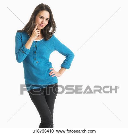 Stock Image - Studio shot of young woman. Fotosearch