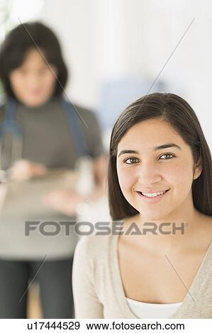 Teenage girl (16-17) in doctor's office View Large Photo Image Stock Photo - Teenage girl (16-17) in doctor's office. Fotosearch