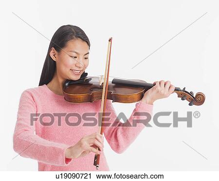 View of teenage girl ( 16-17 years) playing violin View Large Photo Image Stock Image - View of teenage girl ( 16-17 years) playing violin. Fotosearch