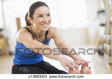 Woman stretching View Large Photo Image Picture - Woman stretching. Fotosearch