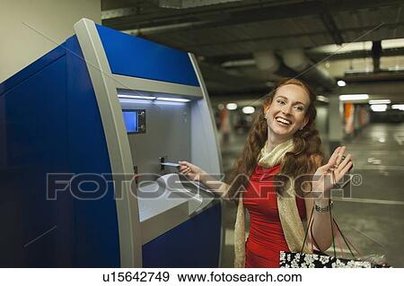 Young woman in parking View Large Photo Image Stock Photo - Young woman in parking. Fotosearch