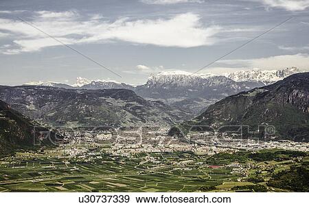 Aerial view of town in rural valley View Large Photo Image Stock Photo - Aerial view of town in rural valley. Fotosearch