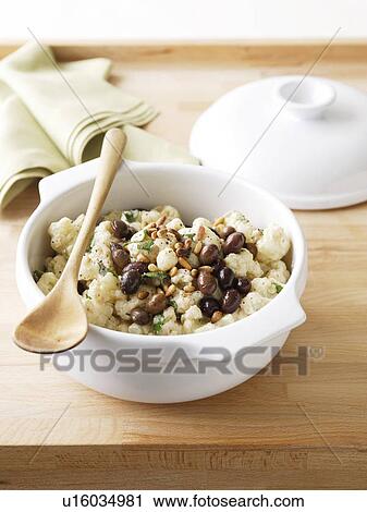Stock Image - Bowl of cauliflower salad. Fotosearch