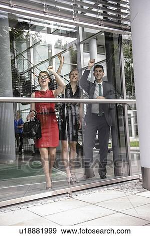 Business people knocking on window View Large Photo Image Stock Photo - Business people knocking on window. Fotosearch