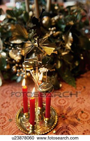 Candles burning on Christmas decoration View Large Photo Image Stock Image - Candles burning on Christmas decoration. Fotosearch
