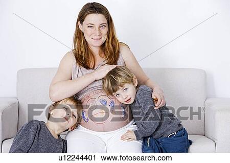 Children drawing on pregnant mother View Large Photo Image Stock Image - Children drawing on pregnant mother. Fotosearch