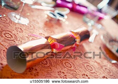 Stock Photograph - Christmas cracker on table. Fotosearch
