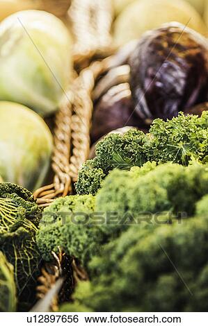 Stock Photograph - Close up of basket of vegetables. Fotosearch
